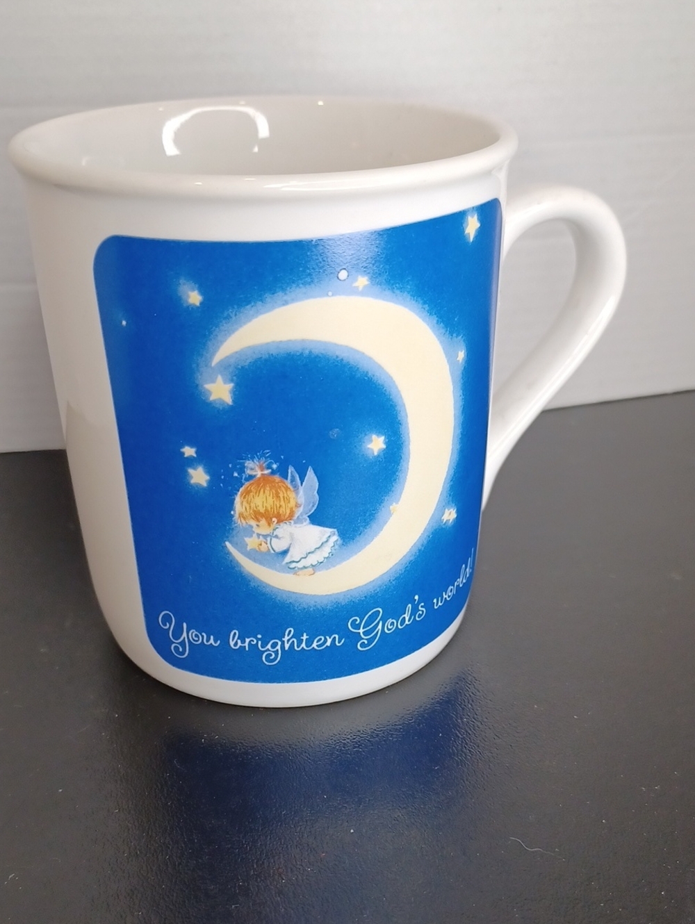 White Ceramic Mug with Blue Moon Angel Design - You Brighten God's World